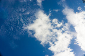 Naklejka na ściany i meble Blue sky with cumulus white cloud