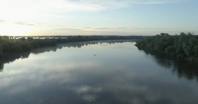 Aerial drone footage. Sunrise on the river. Early morning. 4K.