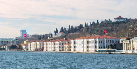Fototapeta premium Waterfront buildings against the backdrop of hills near Bosphorus bridge in Istanbul, Turkey
