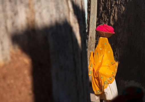 Woman walking in the street, Harar, Ethiopia