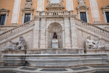 Fototapeta na wymiar View of facade with sculpture of Palace of Senators (Palazzo Senatorio)