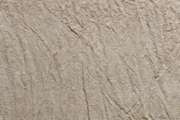 Background texture of linen fabric. Abstract background of crumpled linen fabric.