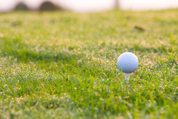 Golf ball on tee ready to be shot