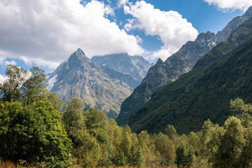 Obraz premium Panorama view on mountains scene in national park of Dombay, Caucasus