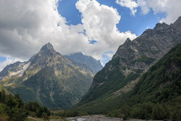 Fototapeta na wymiar Panorama view on mountains with river scene in national park of Dombay