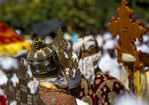 Ethiopian orthodox priests holding sacred crosses during the colorful timkat epiphany festival, Lalibela, Ethiopia