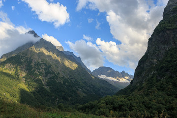 Panorama view on mountains scene in national park of Dombay, Caucasus