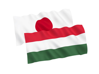 National fabric flags of Hungary and Japan isolated on white background. 3d rendering illustration. 1 to 2 proportion.