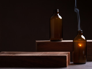 Bottles And Sparkler On Dark Moody Background.