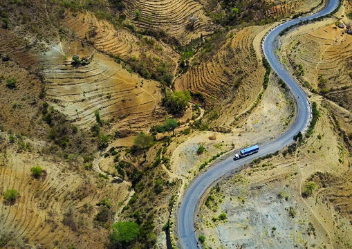 Aerial view of a truck passing in the konso hills and terraces, Omo valley, Konso, Ethiopia