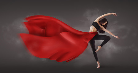 Graceful Woman Dancer Demonstrating Dancing Skill In Weightless Skirt