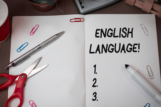 Text sign showing English Language. Business photo showcasing third spoken native lang in world after Chinese and Spanish Scissors and writing equipments plus math book above textured backdrop