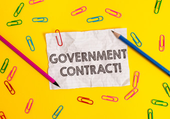 Conceptual hand writing showing Government Contract. Concept meaning Agreement Process to sell Services to the Administration Blank crushed paper sheet message pencils colored background