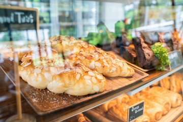 Yummy sweet dessert in glass box of cafe