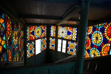 Fototapeta na wymiar Stained glass window in old house at Tbilisi, Georgia