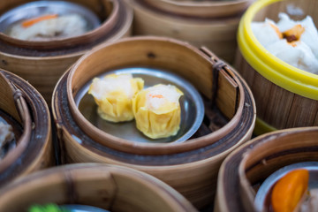 Closeup of Dim Sum in bamboo steamer, Chinese cuisine.