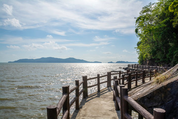 Wooden bridge along the seaside in Thailand
