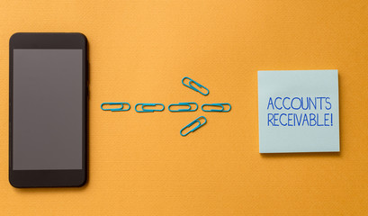Conceptual hand writing showing Accounts Receivable. Concept meaning Legal Claim of Payment Money Owed to by Debtors Colored blank sticky note clips smartphone cool pastel background