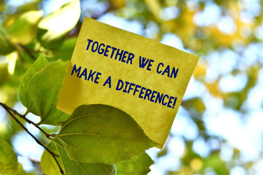 Word writing text Together We Can Make A Difference. Business photo showcasing be very important some way in like team or group Piece of square paper use to give notation on tree leaf under sunny day