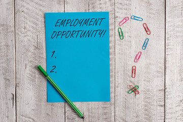 Handwriting text Employment Opportunity. Conceptual photo no Discrimination against Applicant Equal Policy Pastel colour note paper placed next to stationary above the wooden table