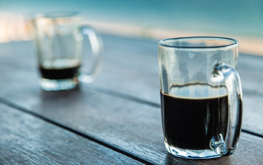 local southeast Asia coffee cups on table background