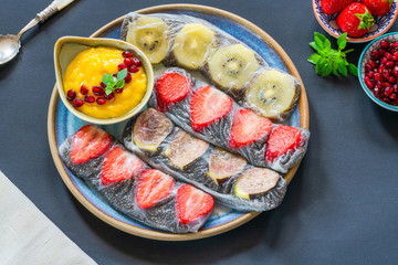 Chia seeds and fruit rice paper rolls with mango dipping sauce