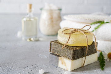 Natural cosmetic oil and natural handmade soap with loofah . Healthy skin care. SPA concept - obrazy, fototapety, plakaty