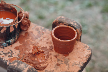 Potter makes a pot of clay