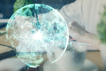 International business hud over woman's hands writing background. Concept of hard work. Double exposure