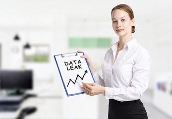 Business, technology, internet and networking concept. Young entrepreneur showing keyword: Data leak