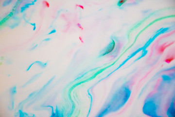 Abstract Purple, Blue and Pink Marbled Background and Texture. Beautiful colors, delicate swirls and interesting texture. Would make the perfect background for unicorn, mermaid or galaxy themes.