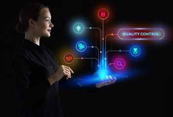 The concept of business, technology, the Internet and the network. A young entrepreneur working on a virtual screen of the future and sees the inscription: Quality control