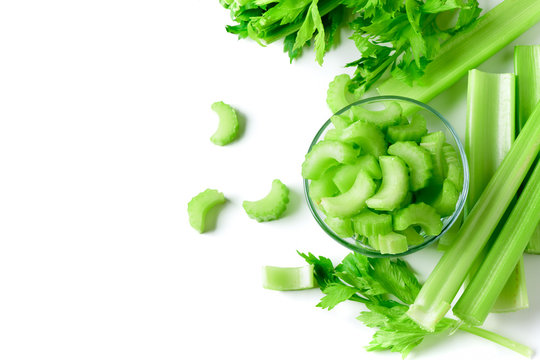 Fresh sliced green celery in glass isolated