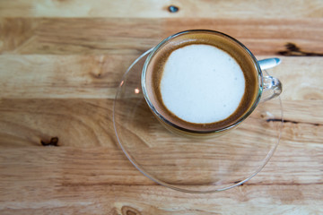 Cappuccino coffee cup  on wooden table