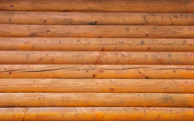 Wooden wall from logs background texture