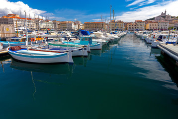 Fototapeta na wymiar Marseilles. Fishing boats near the pier in the old port.