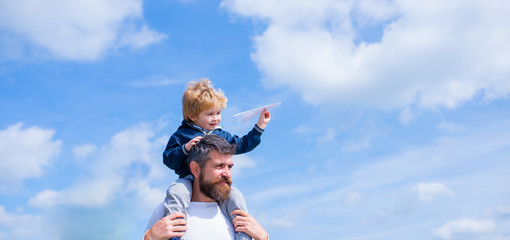 Happy loving family - Father and son. Dream of flying. Portrait of happy father giving son...