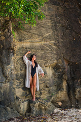 Young girl in consent with nature in transparent