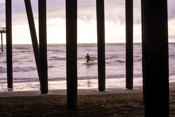 Lone Surfer at Sunset