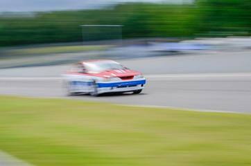 Race car at speed on track