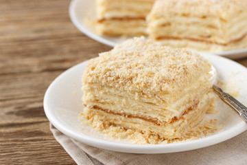 Cake Napoleon of puff pastry with sour cream. Close up.