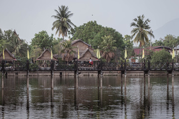 Obraz premium 17 May 2019 , sukhothai Thailand ,School boy is walk across the bridge of the country