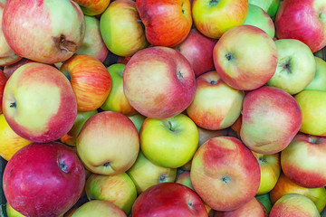 ripe apples in the store on the counter