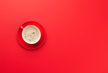 Red coffee cup over red background - Powered by Adobe