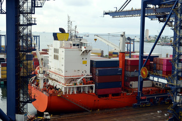 Fototapeta premium Container ship during cargo operations in the port of Cristobal, Panama.