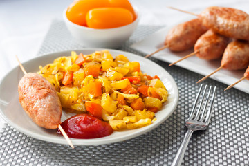 Stewed vegetables with turmeric and cumin and turkey kebab