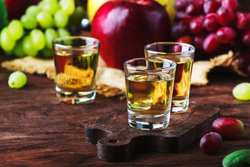 Rakija, raki or rakia - Balkan strong alcoholic drink brandy type based on fermented fruits,...
