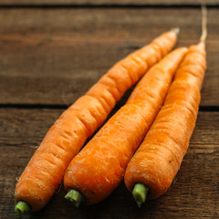 carrots (harvest, fresh and juicy vegetables). food background. top view. copy space