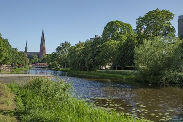 Gorgeous view on town street with cathedral on background. Tourism, travel concept. Europe, Sweden, Uppsala.