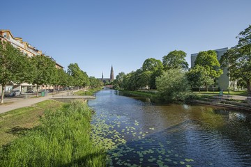 Gorgeous view on town street with cathedral on background. Tourism, travel concept. Europe, Sweden, Uppsala.
